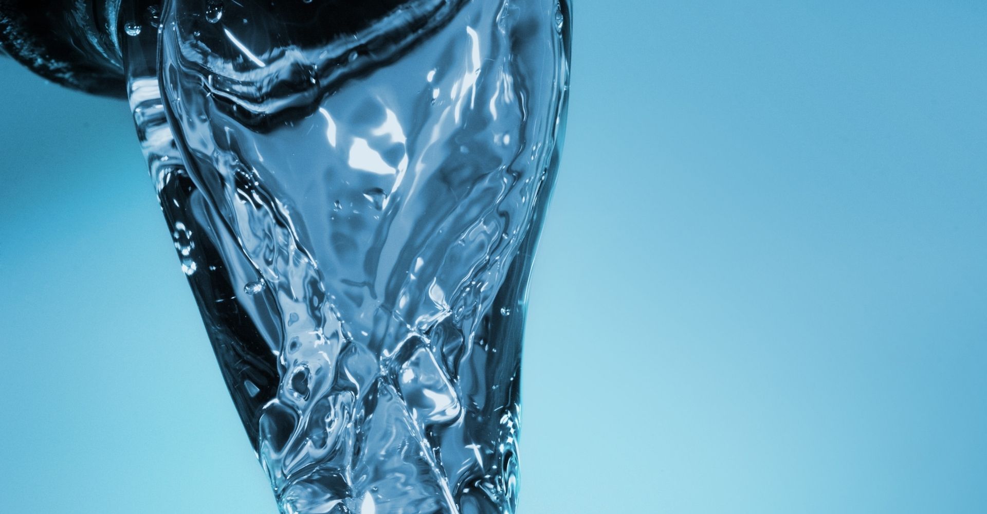 Water flowing from a tap.